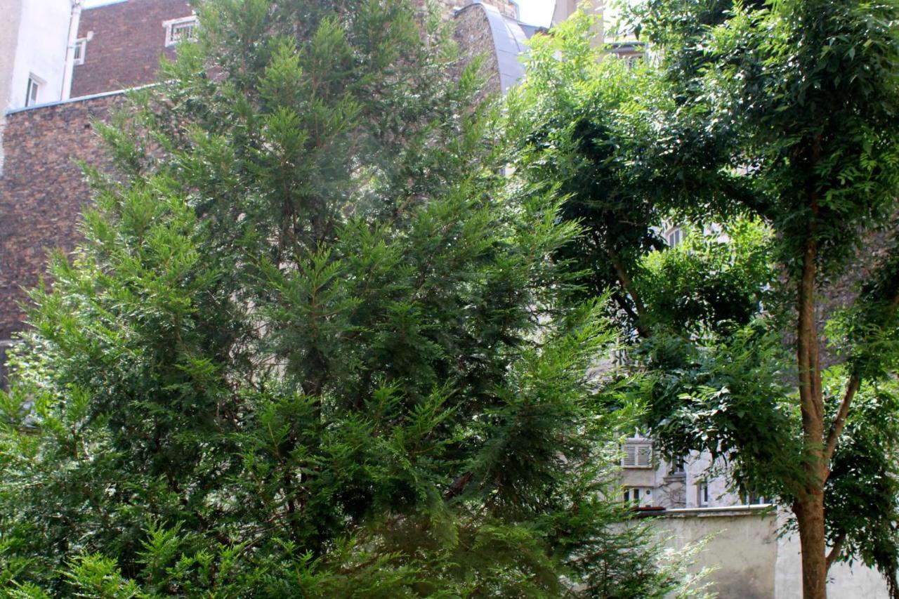 Apartamento A Cosy Gem 2 Steps From The Sacre-Coeur París Exterior foto